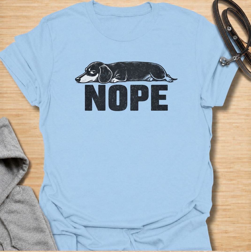 Sometimes the answer is simply nope. This funny dachshund T-shirt features a long, unimpressed sausage dog resting above bold vintage lettering, perfectly capturing the breed’s stubborn and dramatic personality. A simple, highly wearable gift for dachshund owners, doxie lovers, dog moms, and anyone fluent in dachshund attitude.