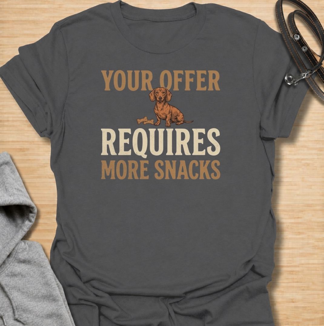 For dachshunds who know every offer can be improved with the addition of snacks. This funny dachshund T-shirt features the phrase “Your Offer Requires More Snacks” with a stubborn little doxie at the center. Perfect for dachshund owners who know treats are less of a reward and more of a bargaining tool. A playful dog lover tee packed with classic sausage dog attitude.