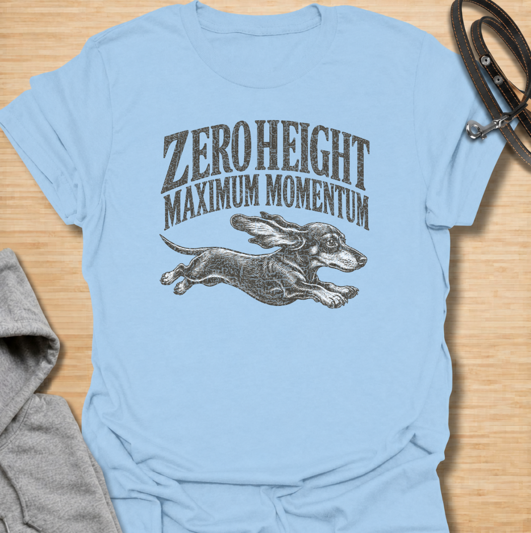 A funny dachshund T-shirt celebrating the surprisingly impressive speed packed into such a low little dog. Featuring the phrase “Zero Height Maximum Momentum” with a running dachshund illustration, this design captures the breed’s energetic and determined personality. Perfect for dachshund moms, dachshund dads, sausage dog owners, and anyone who has seen a dachshund suddenly launch into full-speed mode. A playful vintage-style tee for fans of dachshund humor, wiener dogs, and small dogs with very big energy