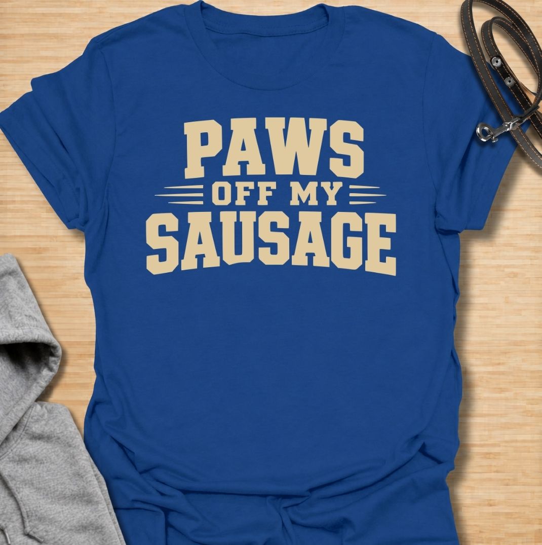 A funny dachshund T-shirt for anyone who takes sausage dog ownership very seriously. Featuring the phrase “Paws Off My Sausage” in bold vintage-inspired lettering, this design delivers a playful double meaning that dachshund lovers will instantly understand. Perfect for dachshund moms, dachshund dads, wiener dog owners, and anyone protective of their favorite little sausage dog. A simple, punchy everyday tee with plenty of dachshund humor and personality.