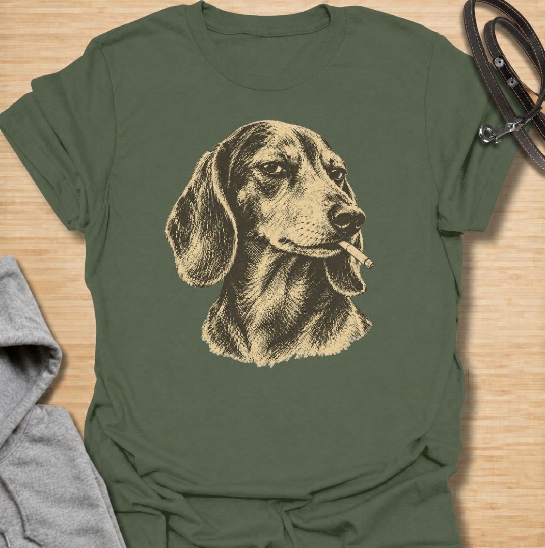 A funny dachshund T-shirt for anyone who loves the breed’s stubborn, mischievous side. Featuring a vintage-style dachshund portrait with a deadpan “bad influence” attitude, this design has a slightly rebellious feel without being overdone. Perfect for dachshund moms, dachshund dads, sausage dog owners, and anyone who knows their doxie is usually up to something. A bold everyday tee for fans of dachshund humor, vintage dog art, and breed-specific gifts.