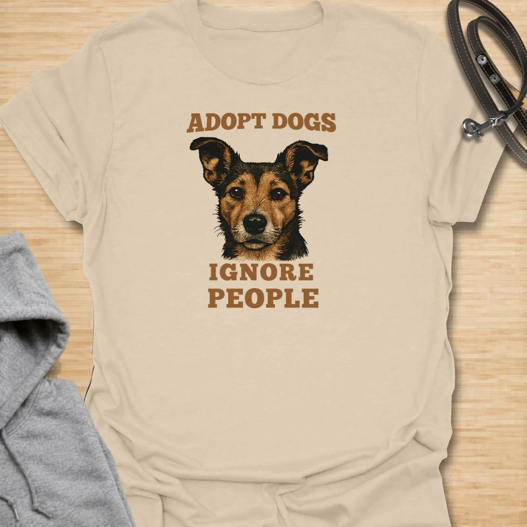 This adopt dogs ignore people t-shirt is perfect for rescue dog lovers with a strong sense of humor. The bold vintage-style text and loyal dog portrait make the design simple, readable, and full of personality. It is a great choice for dog moms, dog dads, rescue supporters, and anyone who would rather spend time with dogs than deal with people. A fun everyday shirt for shelter volunteers, adopters, foster families, and proud dog people who believe rescue dogs deserve all the attention.