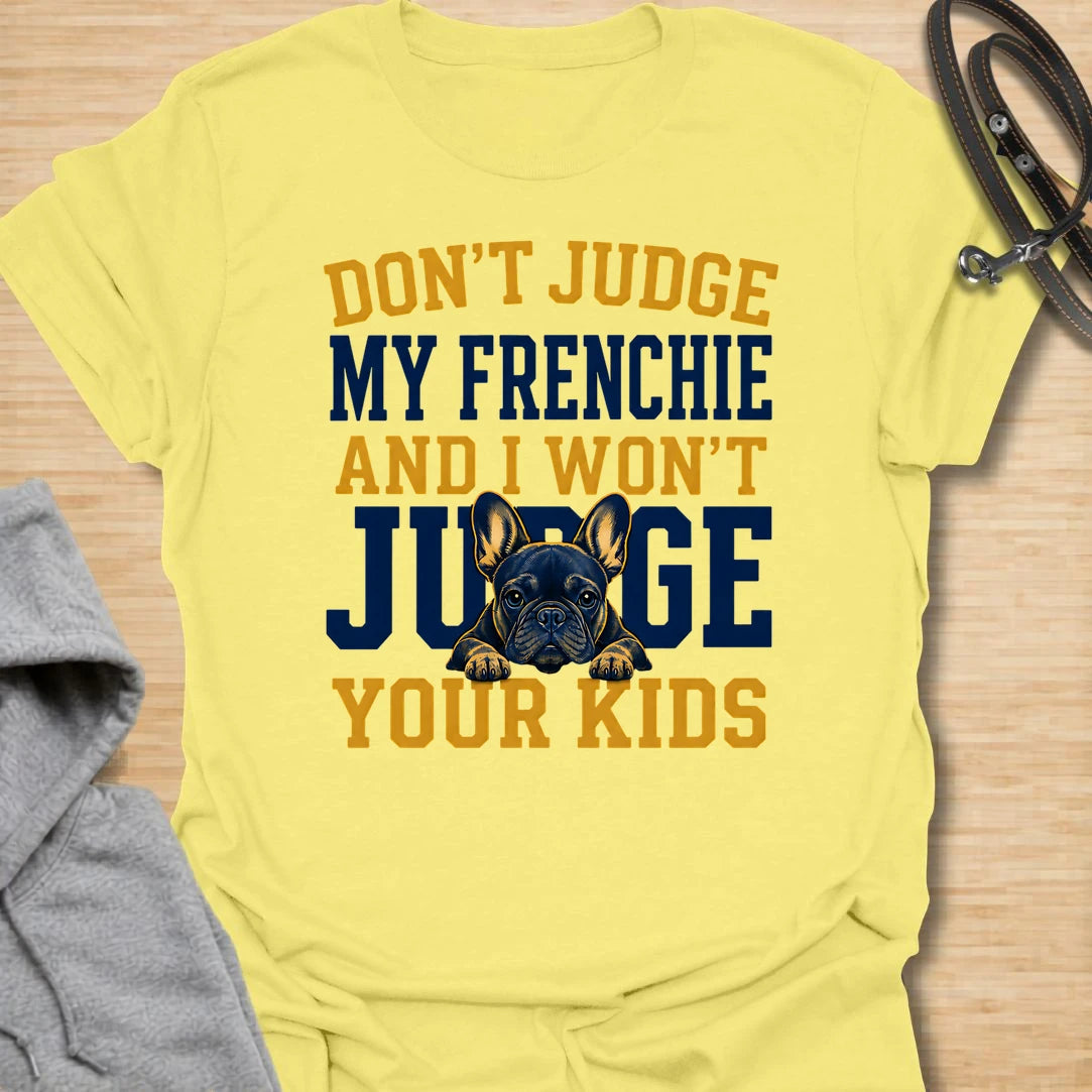 This Don’t Judge My Frenchie t-shirt is made for French Bulldog lovers who know their little dog may be chaotic, but judgment goes both ways. Featuring bold varsity-style lettering and a serious Frenchie peeking through the text, this design has a funny, protective dog-parent feel that Frenchie owners will instantly understand. Perfect for Frenchie moms, Frenchie dads, French Bulldog owners, rescue dog lovers, and anyone who knows their dog’s behavior is not up for discussion.