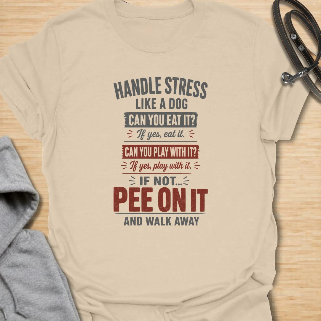 A funny dog T-shirt offering simple canine advice for dealing with everyday stress. Eat it, play with it, or pee on it and walk away—the perfect philosophy for dog lovers with a mischievous sense of humor. A memorable gift for dog moms, dog dads, pet owners, coworkers, and anyone who needs a laugh.