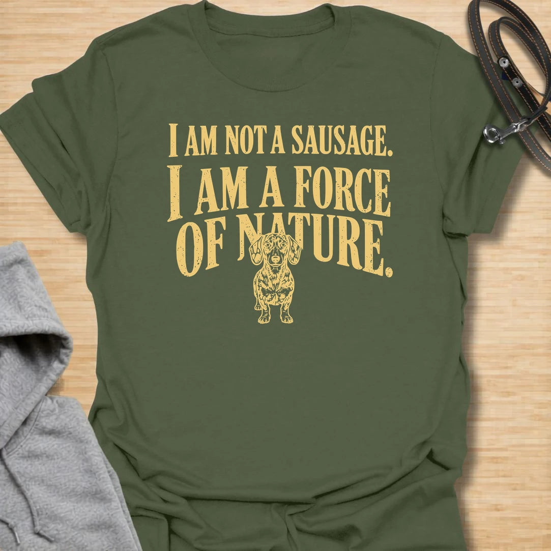 This I Am Not A Sausage I Am A Force Of Nature t-shirt is made for dachshund lovers who know their little long dog is far more powerful than their tiny legs suggest. Featuring bold vintage-style typography and a small fierce dachshund illustration, this design has a funny breed-specific attitude that doxie owners will instantly understand. Perfect for dachshund moms, dachshund dads, wiener dog fans, rescue dog lovers, and anyone whose sausage dog is an unstoppable force of nature.