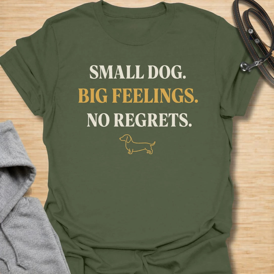 This Small Dog Big Feelings t-shirt is made for dachshund lovers who know their tiny long dog has a huge personality and absolutely no regrets. Featuring bold simple typography, a small dachshund line illustration, and a funny breed-specific message, this design has a clean dog-parent feel that doxie owners will instantly understand. Perfect for dachshund moms, dachshund dads, wiener dog fans, rescue dog lovers, and anyone whose small dog feels everything very dramatically.