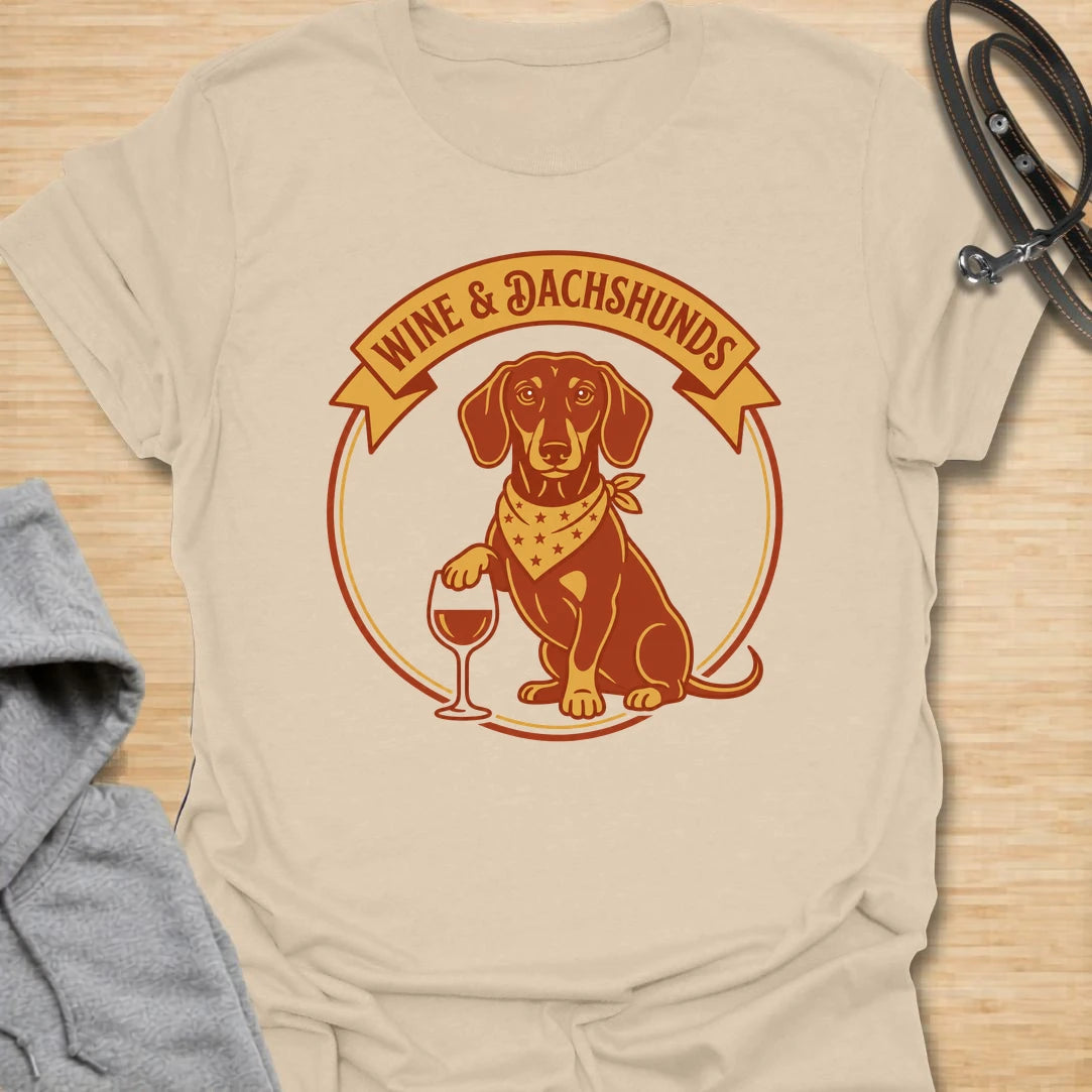 This wine and dachshunds t-shirt is made for doxie lovers who enjoy a good glass of wine and even better dog company. The warm vintage badge design features a dachshund with a wine glass, giving it a cozy, playful feel. It is perfect for dachshund moms, wine lovers, dog moms, and anyone whose ideal evening includes a long dog and a favorite drink. A fun gift for birthdays, dog mom friends, wine nights, or casual weekends at home.