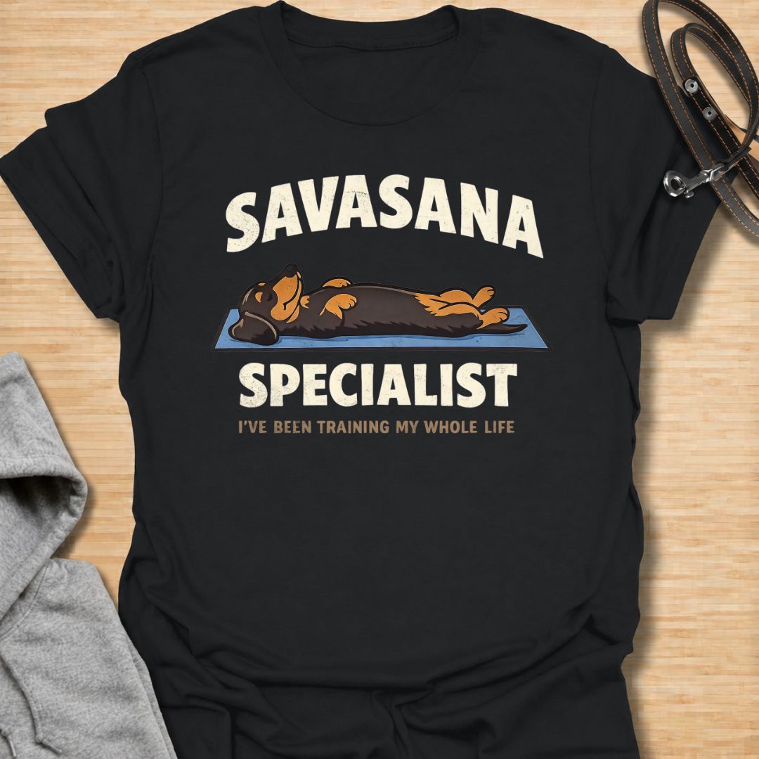 Celebrate expert-level relaxation with this funny “Savasana Specialist” dachshund T-shirt. Featuring a sausage dog stretched out on a yoga mat with the phrase “I’ve Been Training My Whole Life,” it is perfect for dachshund owners, yoga lovers, and devoted nap enthusiasts. A playful gift for doxie moms and dog dads who appreciate rest, humor, and laid-back dachshund personality.