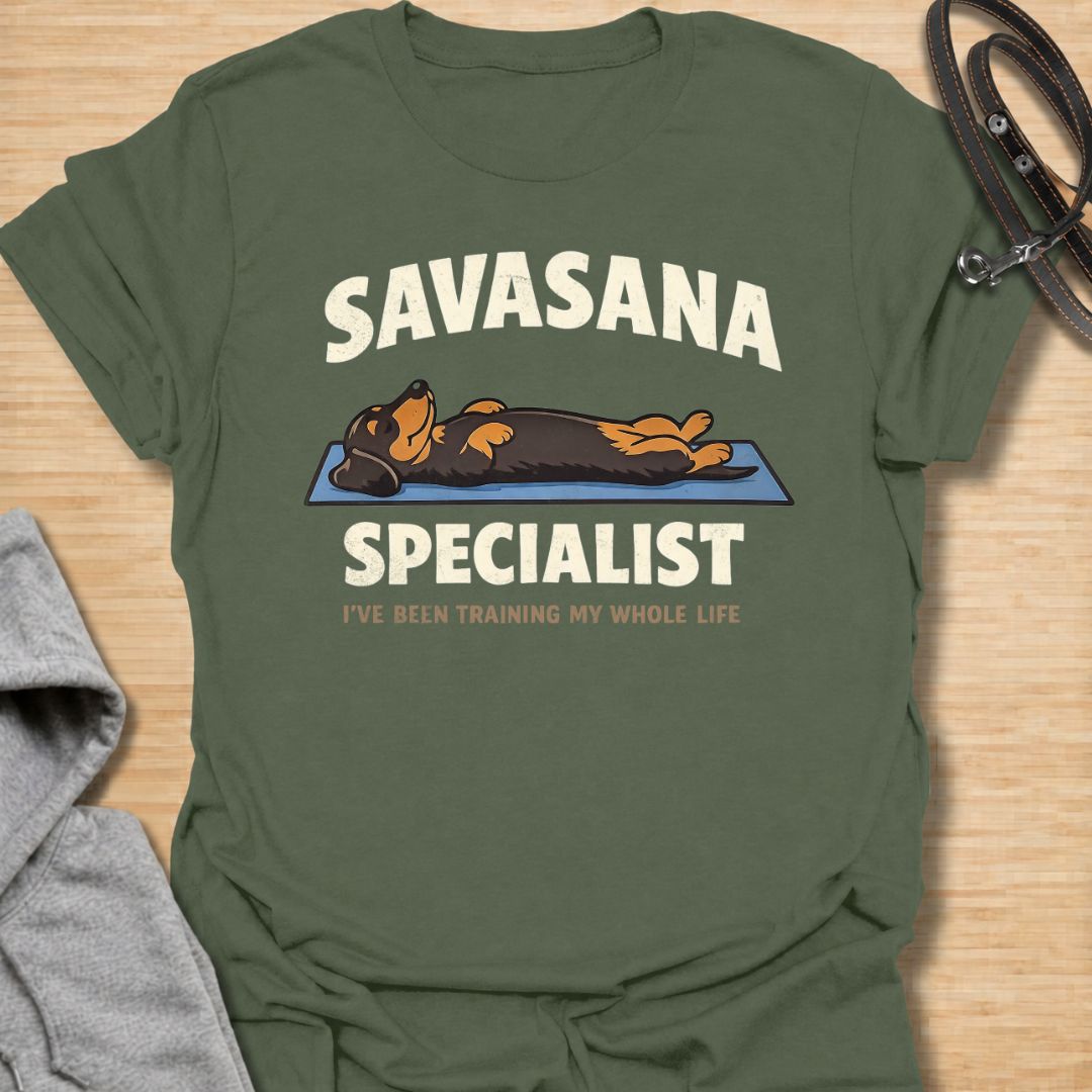 Celebrate expert-level relaxation with this funny “Savasana Specialist” dachshund T-shirt. Featuring a sausage dog stretched out on a yoga mat with the phrase “I’ve Been Training My Whole Life,” it is perfect for dachshund owners, yoga lovers, and devoted nap enthusiasts. A playful gift for doxie moms and dog dads who appreciate rest, humor, and laid-back dachshund personality.