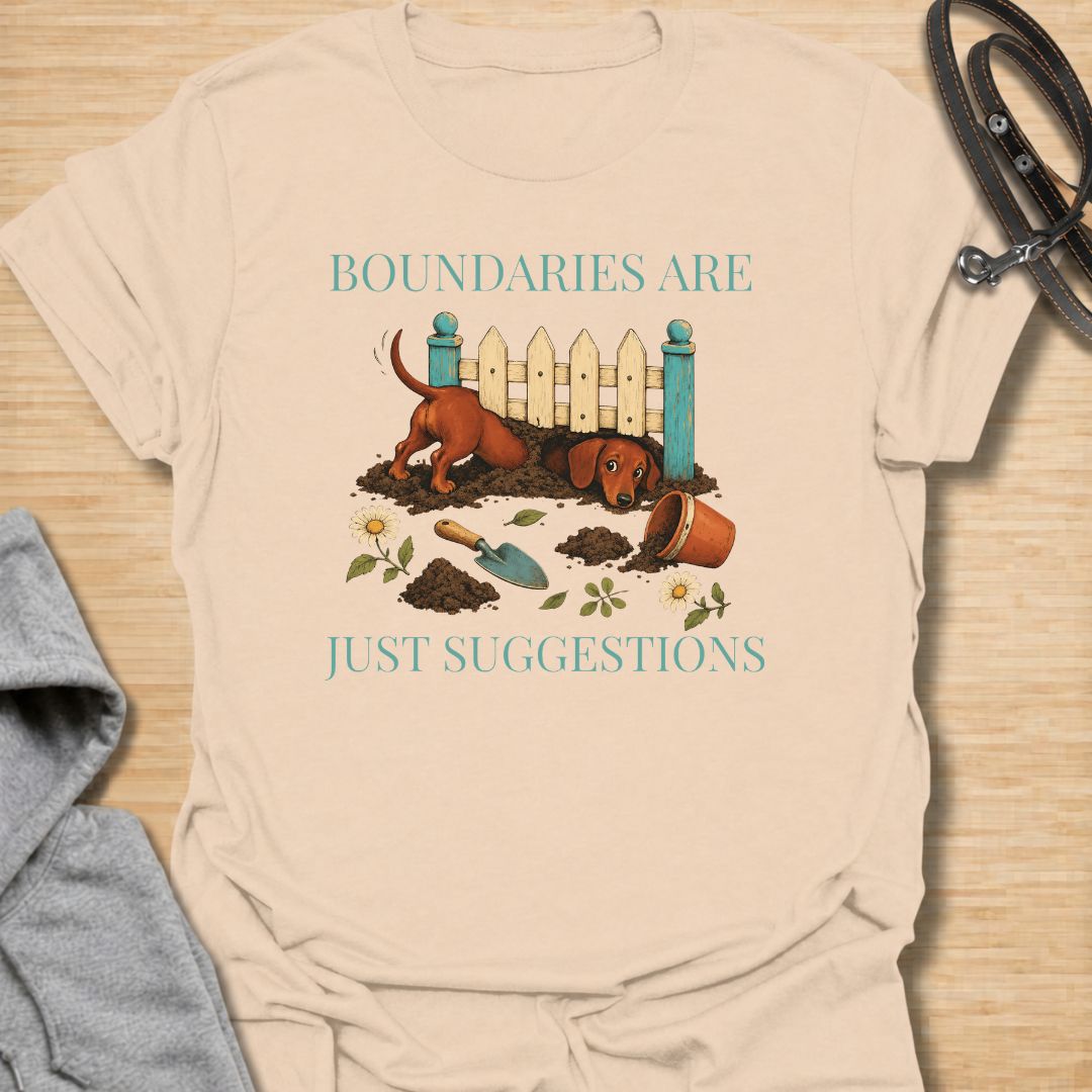 Celebrate the stubborn, determined nature of dachshunds with this funny “Boundaries Are Just Suggestions” T-shirt. Featuring a mischievous sausage dog digging beneath a garden fence, it is perfect for dachshund moms, dog dads, gardeners, and devoted doxie lovers. A playful gift for anyone whose curious little dog treats every fence and household rule as a challenge.