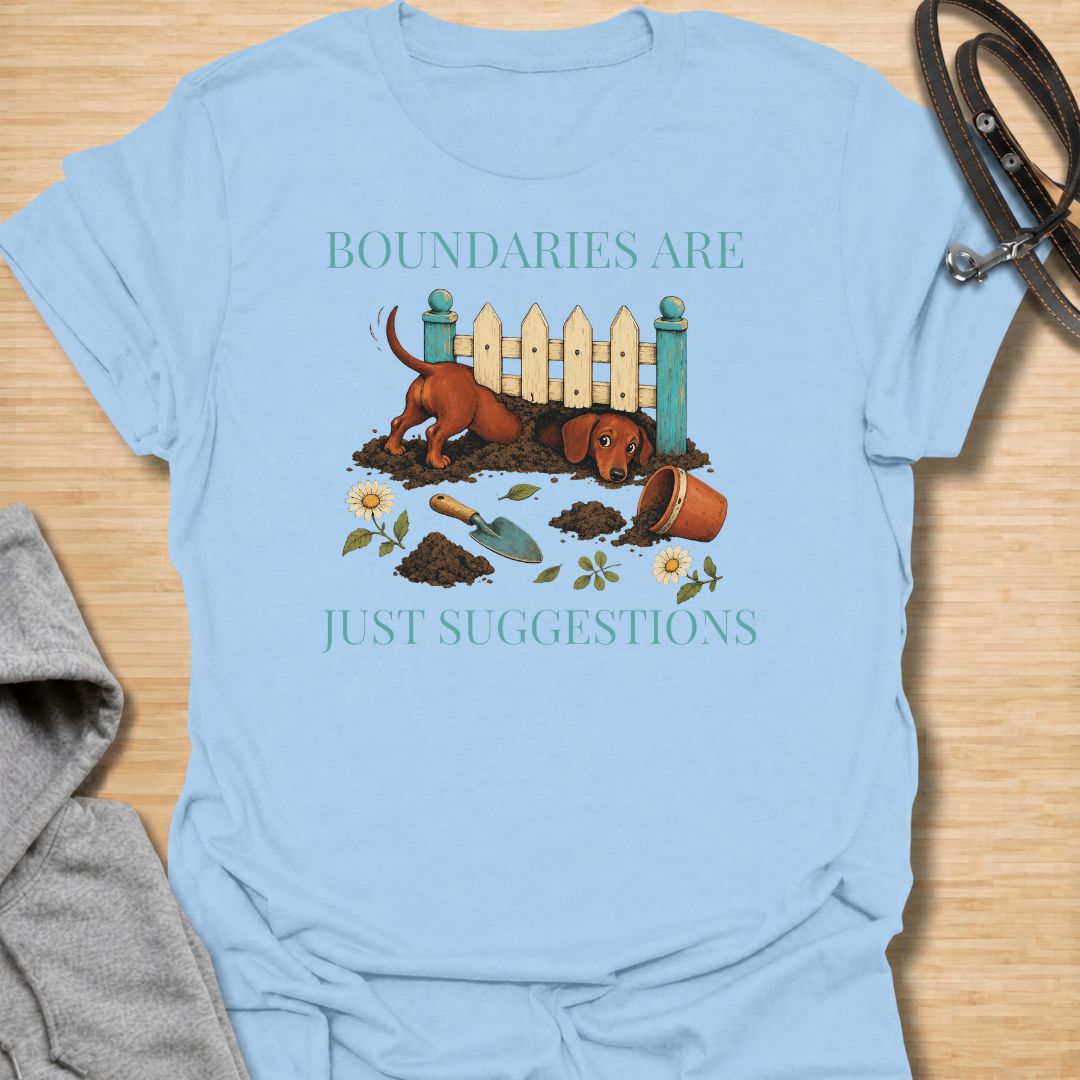 Celebrate the stubborn, determined nature of dachshunds with this funny “Boundaries Are Just Suggestions” T-shirt. Featuring a mischievous sausage dog digging beneath a garden fence, it is perfect for dachshund moms, dog dads, gardeners, and devoted doxie lovers. A playful gift for anyone whose curious little dog treats every fence and household rule as a challenge.