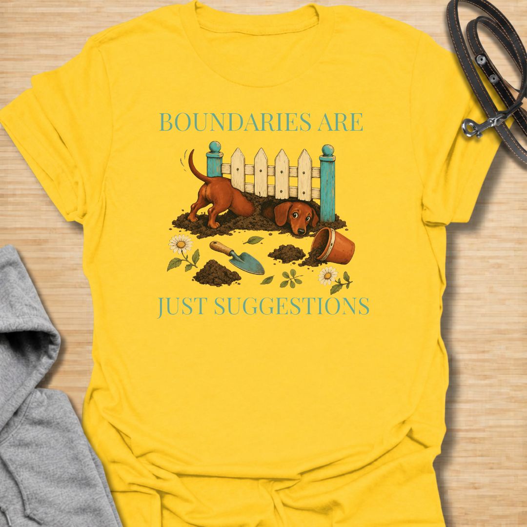 Celebrate the stubborn, determined nature of dachshunds with this funny “Boundaries Are Just Suggestions” T-shirt. Featuring a mischievous sausage dog digging beneath a garden fence, it is perfect for dachshund moms, dog dads, gardeners, and devoted doxie lovers. A playful gift for anyone whose curious little dog treats every fence and household rule as a challenge.