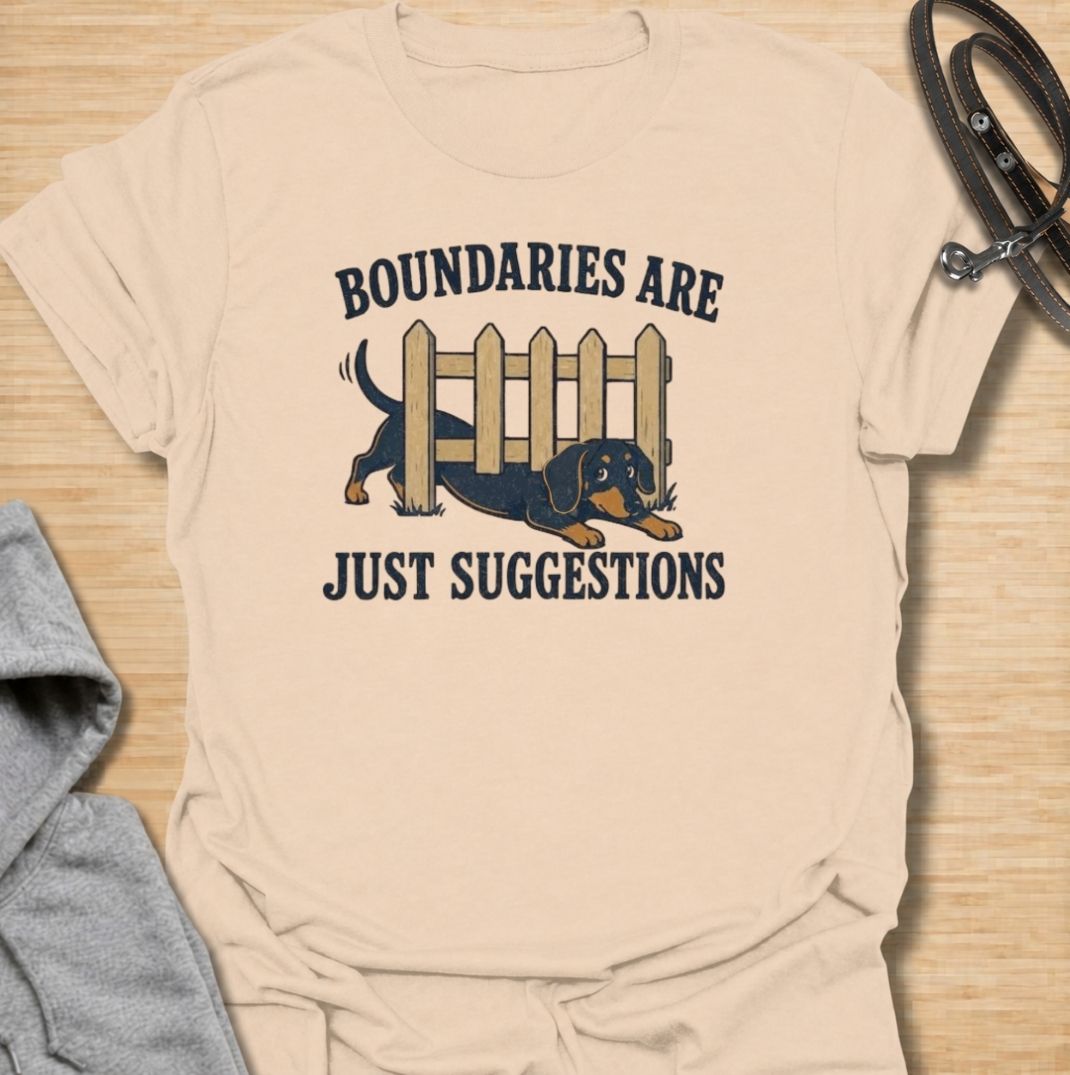 Boundaries are just suggestions when you live with a determined dachshund. This funny dachshund T-shirt features a mischievous sausage dog squeezing beneath a fence, perfectly capturing the breed’s stubborn, curious nature. A fun gift for dachshund moms, dads, and doxie lovers.