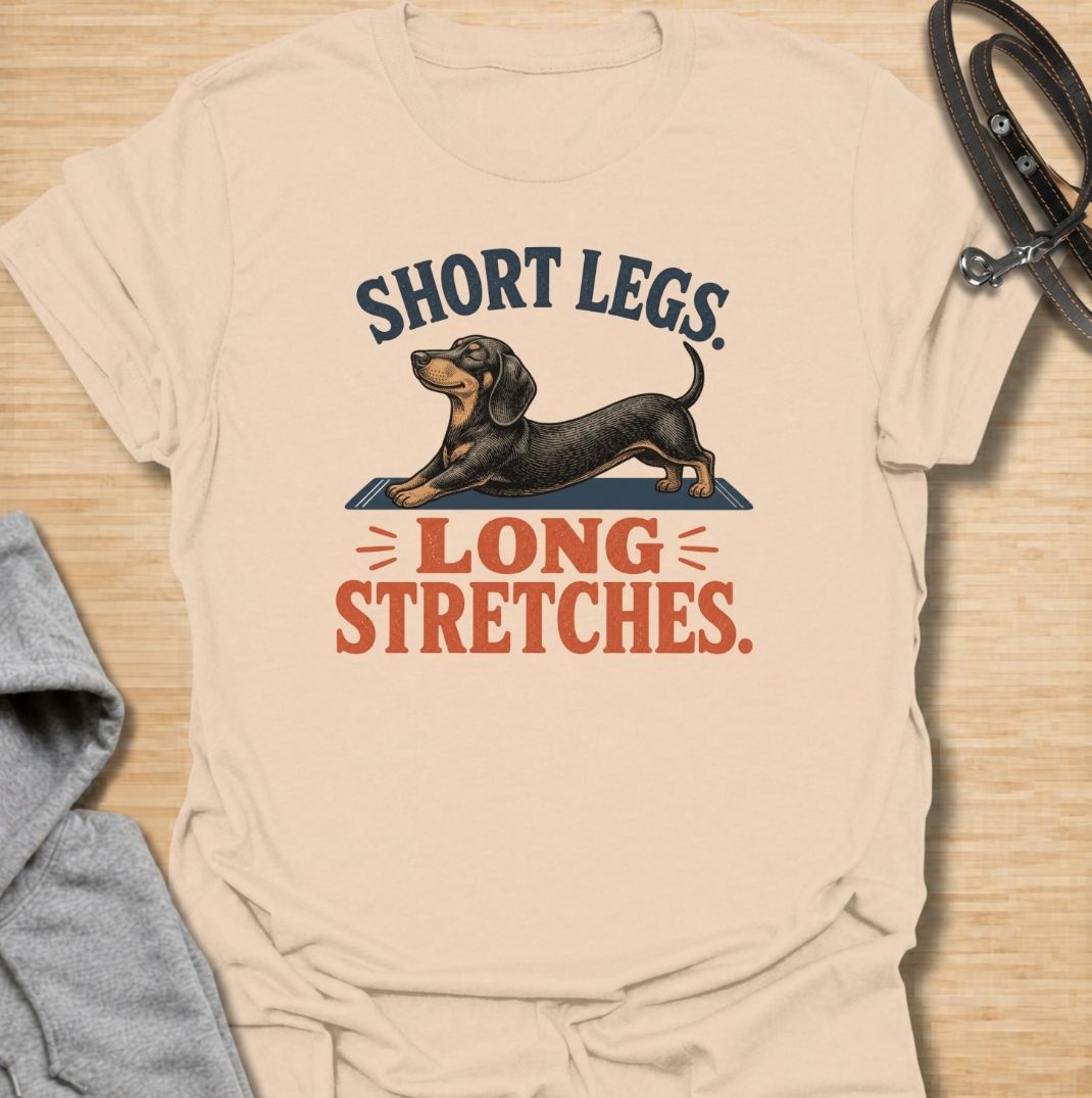 Short legs, long stretches. A funny dachshund T-shirt celebrating the unmistakable full-body stretch of everyone’s favorite sausage dog.