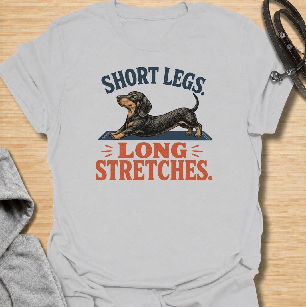 Short legs, long stretches. A funny dachshund T-shirt celebrating the unmistakable full-body stretch of everyone’s favorite sausage dog.