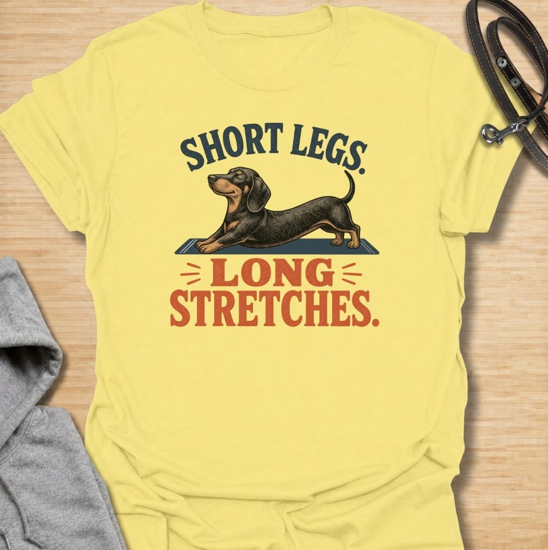 Short legs, long stretches. A funny dachshund T-shirt celebrating the unmistakable full-body stretch of everyone’s favorite sausage dog.
