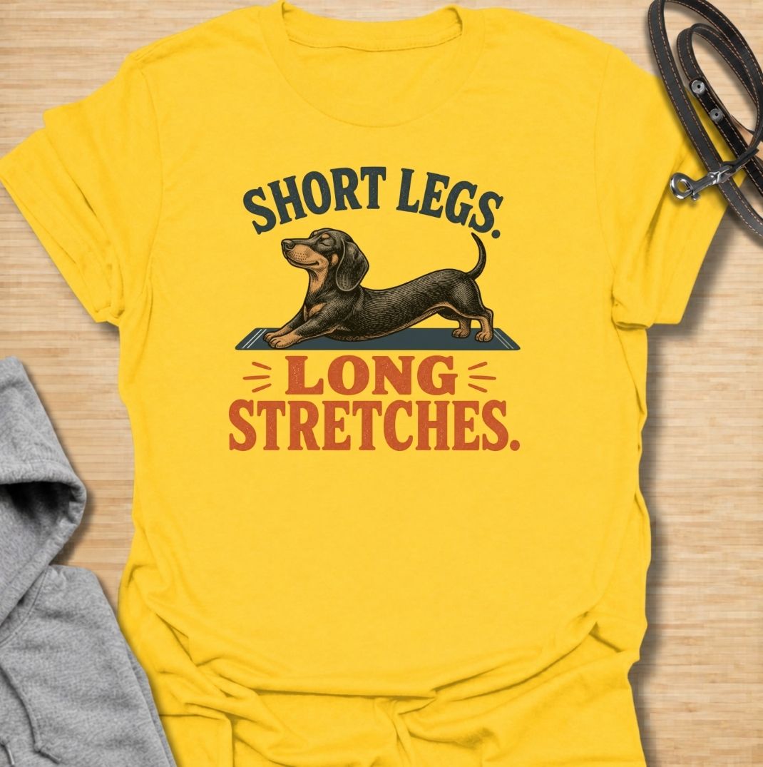 Short legs, long stretches. A funny dachshund T-shirt celebrating the unmistakable full-body stretch of everyone’s favorite sausage dog.