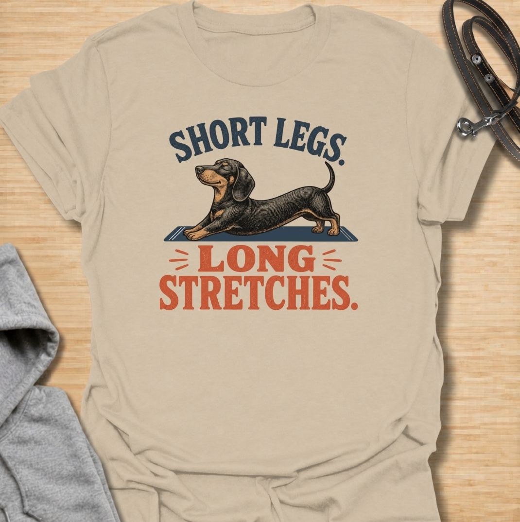 Short legs, long stretches. A funny dachshund T-shirt celebrating the unmistakable full-body stretch of everyone’s favorite sausage dog.