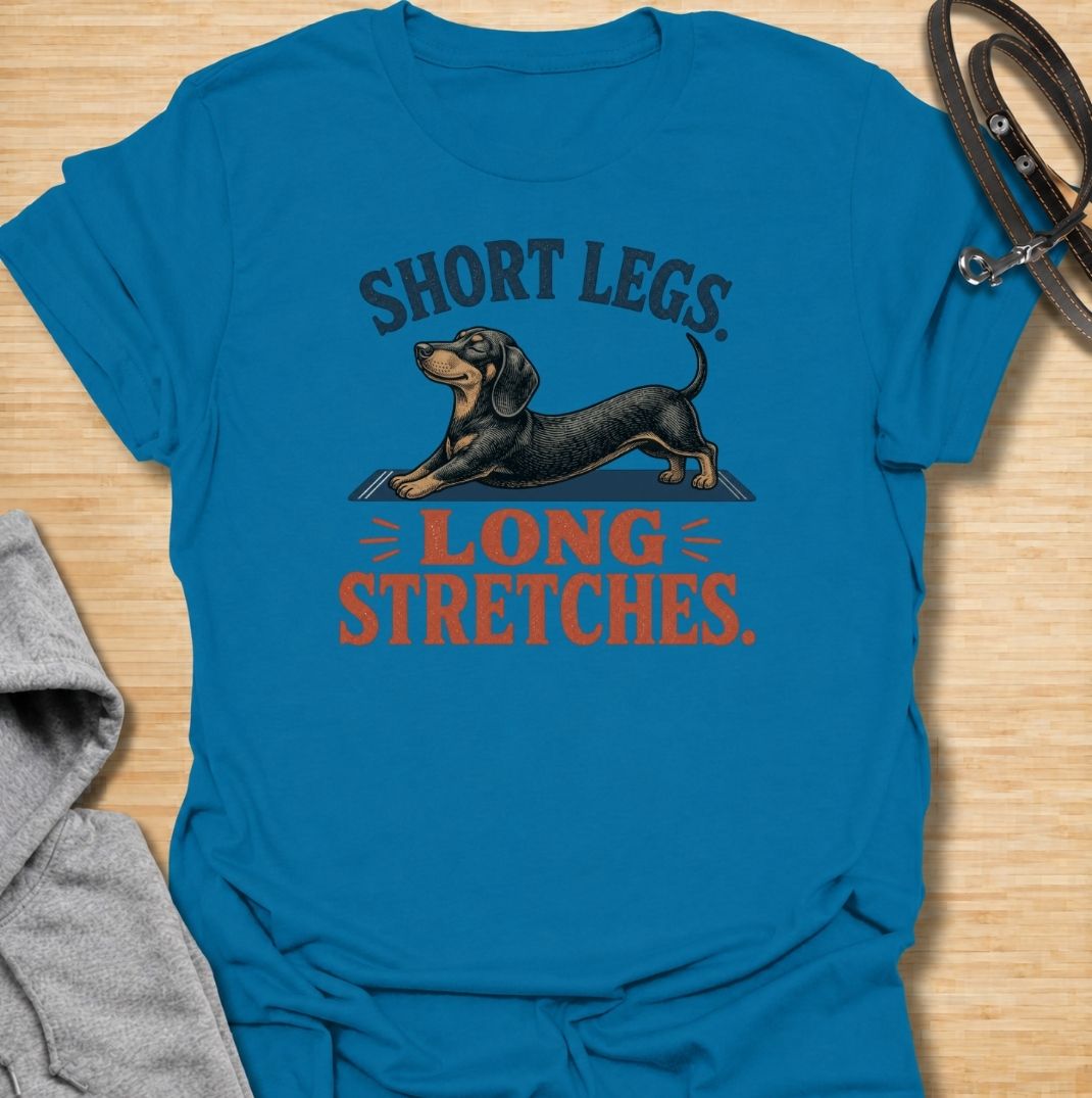 Short legs, long stretches. A funny dachshund T-shirt celebrating the unmistakable full-body stretch of everyone’s favorite sausage dog.