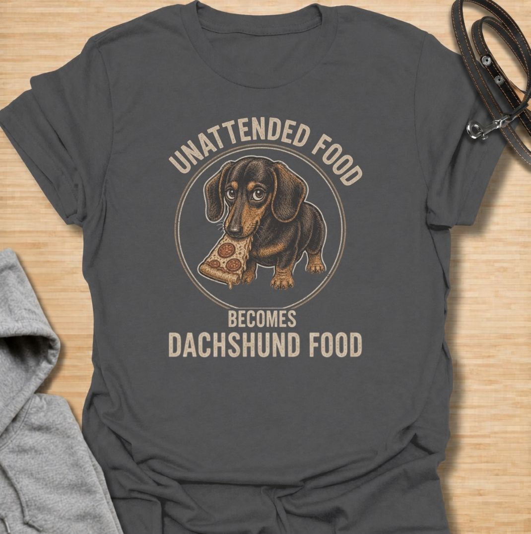 Unattended food becomes dachshund food. A funny dachshund T-shirt for sausage dog owners who know no snack is ever truly safe.