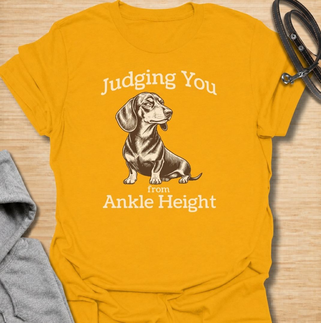 Judging you from ankle height. A funny dachshund T-shirt for sausage dog owners who know those short legs come with very big opinions.