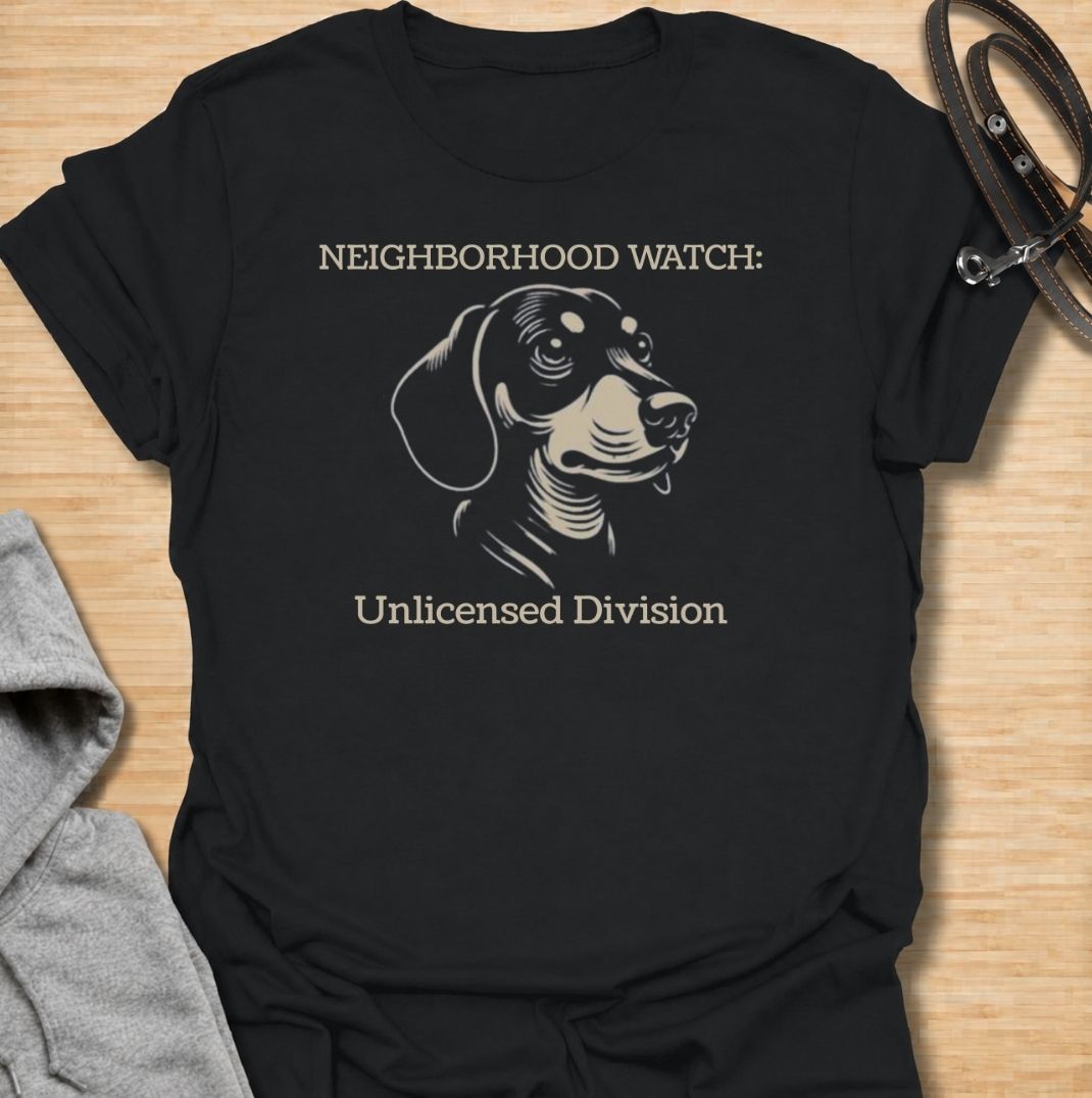 Neighborhood Watch: Unlicensed Division. A funny dachshund T-shirt for sausage dog owners whose little watchdog monitors every movement on the street.