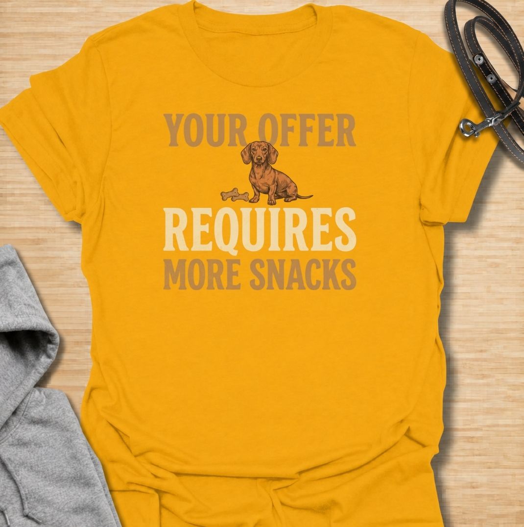 For dachshunds who know every offer can be improved with the addition of snacks. This funny dachshund T-shirt features the phrase “Your Offer Requires More Snacks” with a stubborn little doxie at the center. Perfect for dachshund owners who know treats are less of a reward and more of a bargaining tool. A playful dog lover tee packed with classic sausage dog attitude.