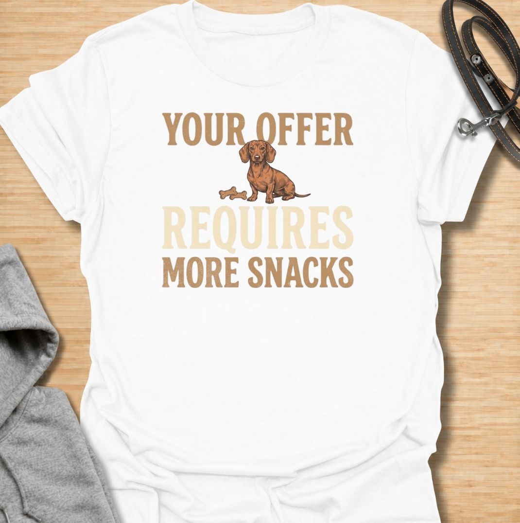 For dachshunds who know every offer can be improved with the addition of snacks. This funny dachshund T-shirt features the phrase “Your Offer Requires More Snacks” with a stubborn little doxie at the center. Perfect for dachshund owners who know treats are less of a reward and more of a bargaining tool. A playful dog lover tee packed with classic sausage dog attitude.