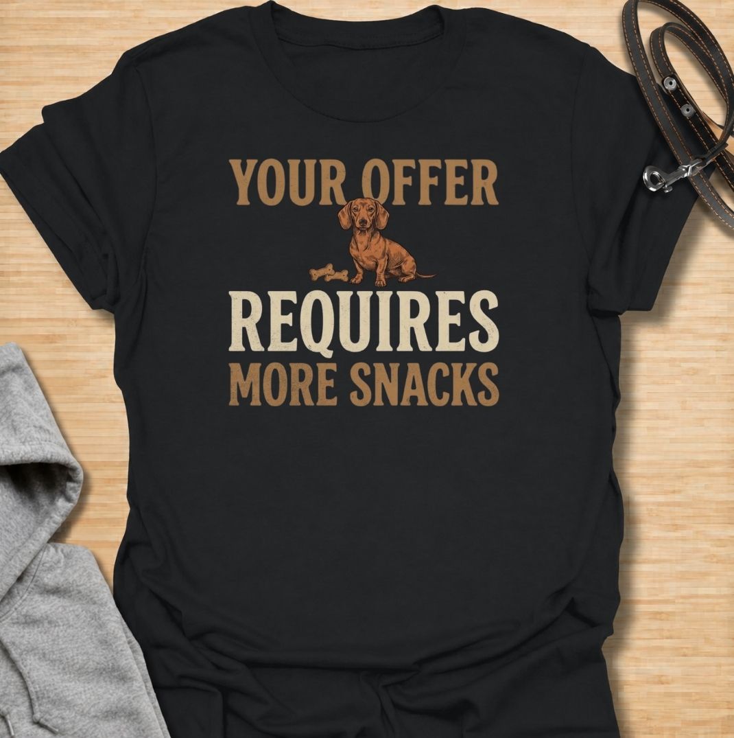 For dachshunds who know every offer can be improved with the addition of snacks. This funny dachshund T-shirt features the phrase “Your Offer Requires More Snacks” with a stubborn little doxie at the center. Perfect for dachshund owners who know treats are less of a reward and more of a bargaining tool. A playful dog lover tee packed with classic sausage dog attitude.
