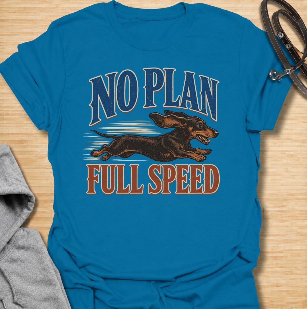 For dachshunds who have absolutely no idea where they’re going, but are determined to get there at maximum speed. This funny dachshund T-shirt features the phrase “No Plan, Full Speed” with a racing doxie illustration and bold vintage typography. Perfect for owners of energetic, impulsive and wonderfully chaotic sausage dogs. A fun dachshund tee that captures the breed’s fearless little personality perfectly.