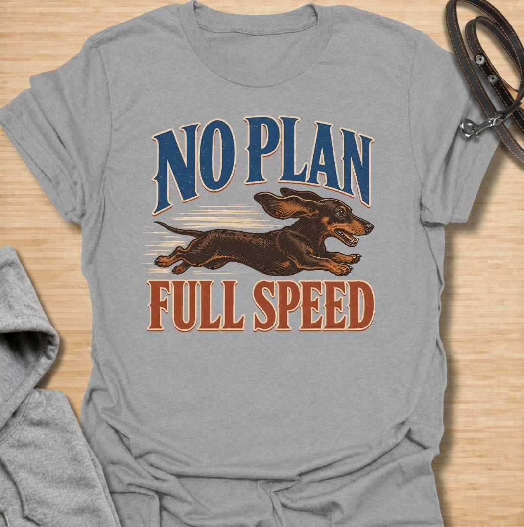 For dachshunds who have absolutely no idea where they’re going, but are determined to get there at maximum speed. This funny dachshund T-shirt features the phrase “No Plan, Full Speed” with a racing doxie illustration and bold vintage typography. Perfect for owners of energetic, impulsive and wonderfully chaotic sausage dogs. A fun dachshund tee that captures the breed’s fearless little personality perfectly.