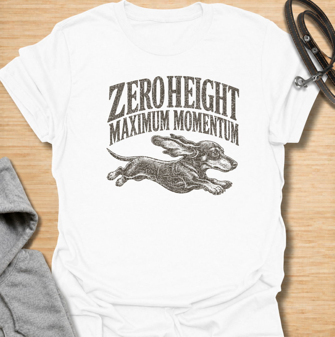 A funny dachshund T-shirt celebrating the surprisingly impressive speed packed into such a low little dog. Featuring the phrase “Zero Height Maximum Momentum” with a running dachshund illustration, this design captures the breed’s energetic and determined personality. Perfect for dachshund moms, dachshund dads, sausage dog owners, and anyone who has seen a dachshund suddenly launch into full-speed mode. A playful vintage-style tee for fans of dachshund humor, wiener dogs, and small dogs with very big energy