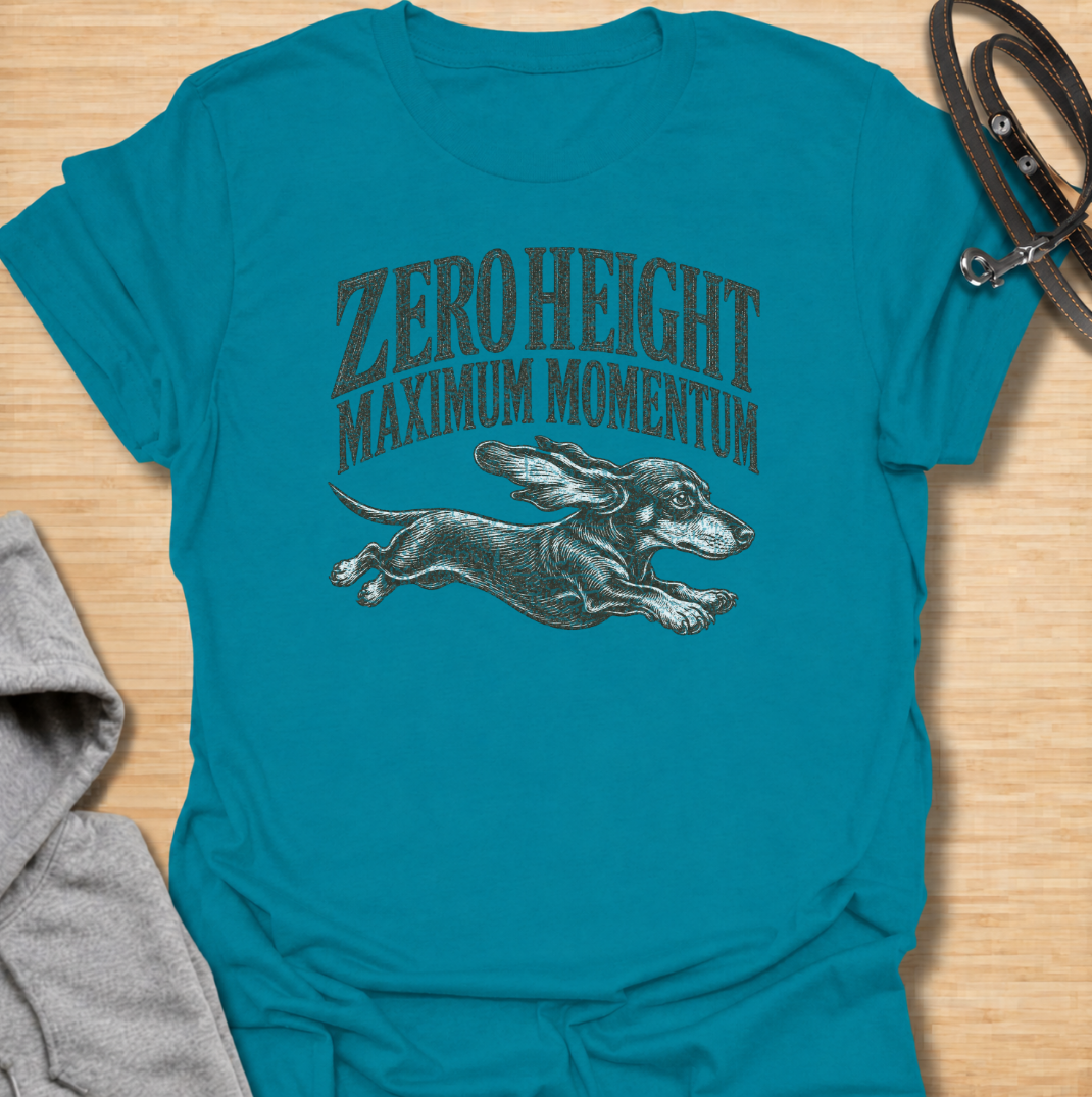 A funny dachshund T-shirt celebrating the surprisingly impressive speed packed into such a low little dog. Featuring the phrase “Zero Height Maximum Momentum” with a running dachshund illustration, this design captures the breed’s energetic and determined personality. Perfect for dachshund moms, dachshund dads, sausage dog owners, and anyone who has seen a dachshund suddenly launch into full-speed mode. A playful vintage-style tee for fans of dachshund humor, wiener dogs, and small dogs with very big energy