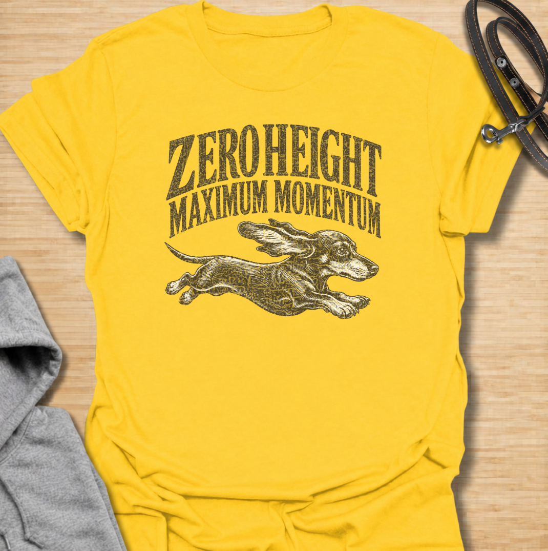 A funny dachshund T-shirt celebrating the surprisingly impressive speed packed into such a low little dog. Featuring the phrase “Zero Height Maximum Momentum” with a running dachshund illustration, this design captures the breed’s energetic and determined personality. Perfect for dachshund moms, dachshund dads, sausage dog owners, and anyone who has seen a dachshund suddenly launch into full-speed mode. A playful vintage-style tee for fans of dachshund humor, wiener dogs, and small dogs with very big energy
