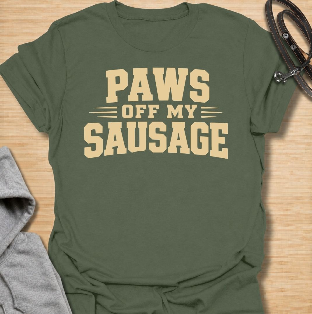A funny dachshund T-shirt for anyone who takes sausage dog ownership very seriously. Featuring the phrase “Paws Off My Sausage” in bold vintage-inspired lettering, this design delivers a playful double meaning that dachshund lovers will instantly understand. Perfect for dachshund moms, dachshund dads, wiener dog owners, and anyone protective of their favorite little sausage dog. A simple, punchy everyday tee with plenty of dachshund humor and personality.