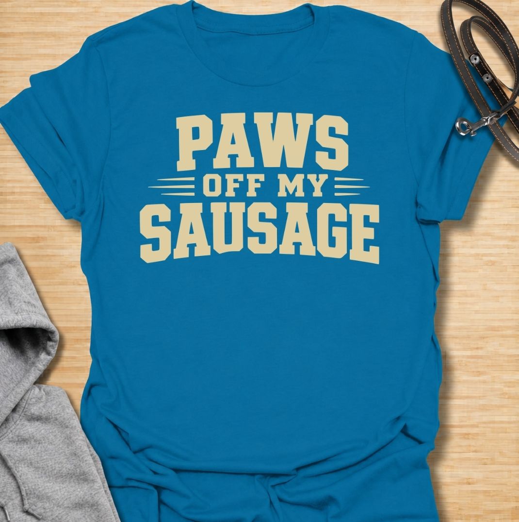 A funny dachshund T-shirt for anyone who takes sausage dog ownership very seriously. Featuring the phrase “Paws Off My Sausage” in bold vintage-inspired lettering, this design delivers a playful double meaning that dachshund lovers will instantly understand. Perfect for dachshund moms, dachshund dads, wiener dog owners, and anyone protective of their favorite little sausage dog. A simple, punchy everyday tee with plenty of dachshund humor and personality.