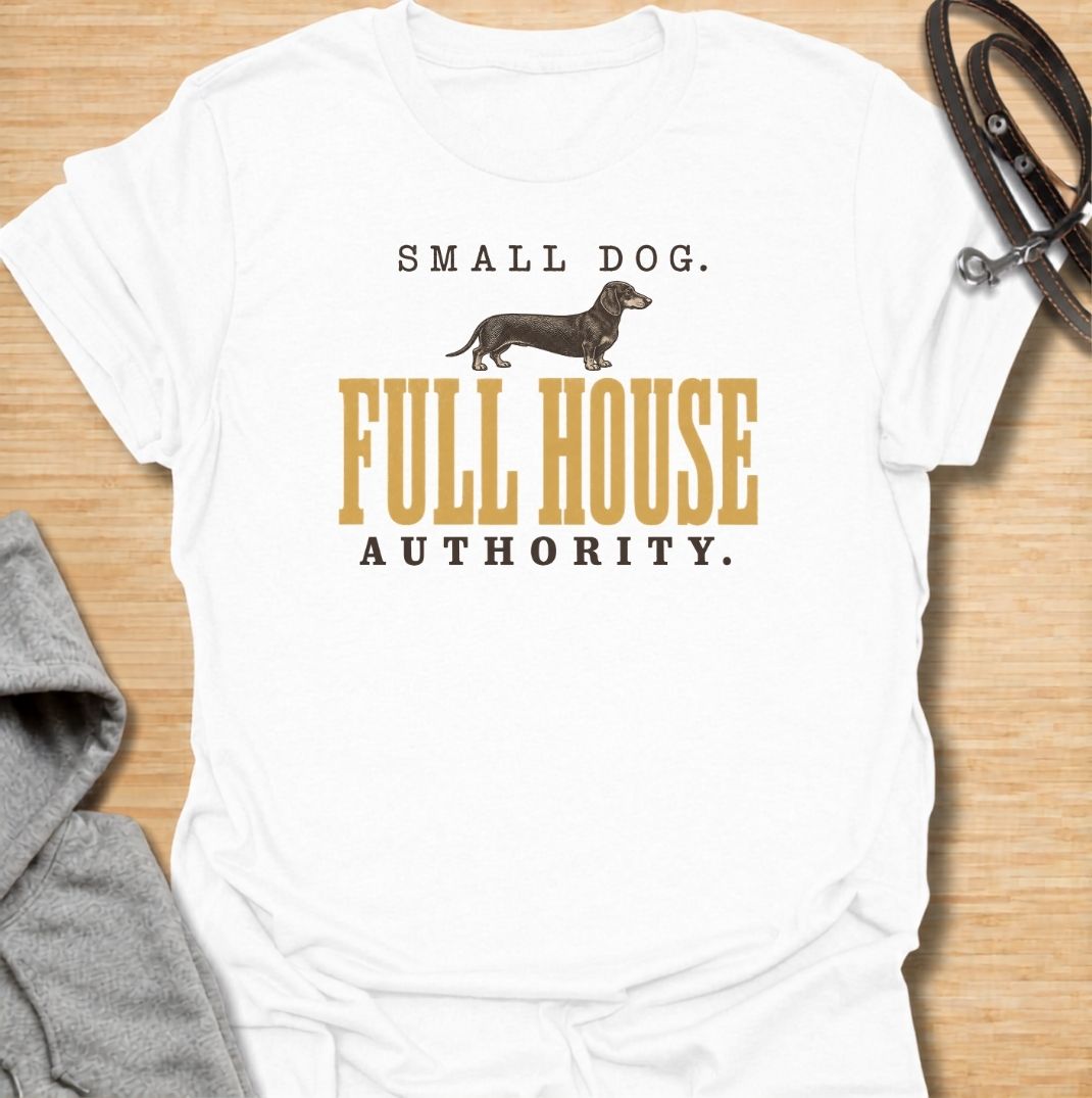 A funny dachshund T-shirt for anyone who knows a small dog can somehow run the entire household. Featuring the phrase “Small Dog. Full House Authority.” with a simple dachshund illustration, this design captures the breed’s confident, bossy personality in a clean vintage-inspired style. Perfect for dachshund moms, dachshund dads, sausage dog owners, and anyone whose little dog acts like the head of the house. A playful everyday tee for fans of dachshund humor, wiener dogs, and small dogs with very big opini