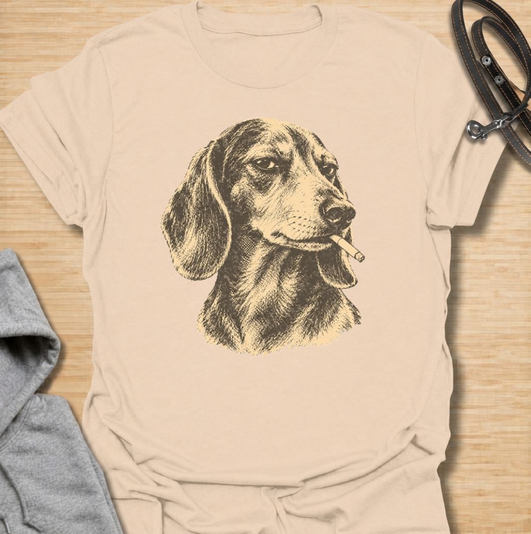 A funny dachshund T-shirt for anyone who loves the breed’s stubborn, mischievous side. Featuring a vintage-style dachshund portrait with a deadpan “bad influence” attitude, this design has a slightly rebellious feel without being overdone. Perfect for dachshund moms, dachshund dads, sausage dog owners, and anyone who knows their doxie is usually up to something. A bold everyday tee for fans of dachshund humor, vintage dog art, and breed-specific gifts.