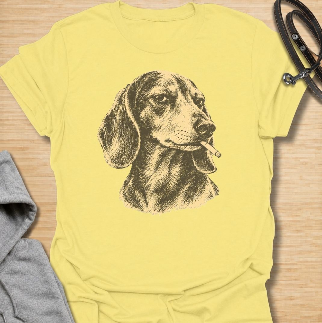 A funny dachshund T-shirt for anyone who loves the breed’s stubborn, mischievous side. Featuring a vintage-style dachshund portrait with a deadpan “bad influence” attitude, this design has a slightly rebellious feel without being overdone. Perfect for dachshund moms, dachshund dads, sausage dog owners, and anyone who knows their doxie is usually up to something. A bold everyday tee for fans of dachshund humor, vintage dog art, and breed-specific gifts.