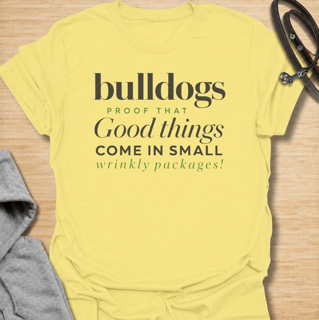 A funny bulldog T-shirt for anyone who loves those compact dogs with oversized personalities and unmistakable wrinkles. Featuring the phrase “Bulldogs — Proof That Good Things Come in Small Wrinkly Packages,” this clean text-based design celebrates the breed’s charm with warm, affectionate humor. Perfect for bulldog moms, bulldog dads, French Bulldog lovers, English Bulldog owners, and anyone who adores wrinkly little dogs. A playful everyday tee for fans of bulldog humor, dog lover gifts, and breed-specifi