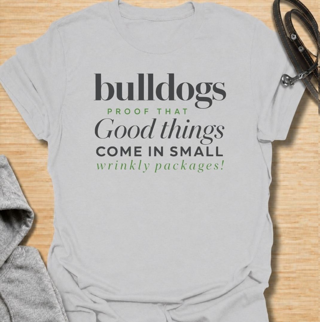 A funny bulldog T-shirt for anyone who loves those compact dogs with oversized personalities and unmistakable wrinkles. Featuring the phrase “Bulldogs — Proof That Good Things Come in Small Wrinkly Packages,” this clean text-based design celebrates the breed’s charm with warm, affectionate humor. Perfect for bulldog moms, bulldog dads, French Bulldog lovers, English Bulldog owners, and anyone who adores wrinkly little dogs. A playful everyday tee for fans of bulldog humor, dog lover gifts, and breed-specifi