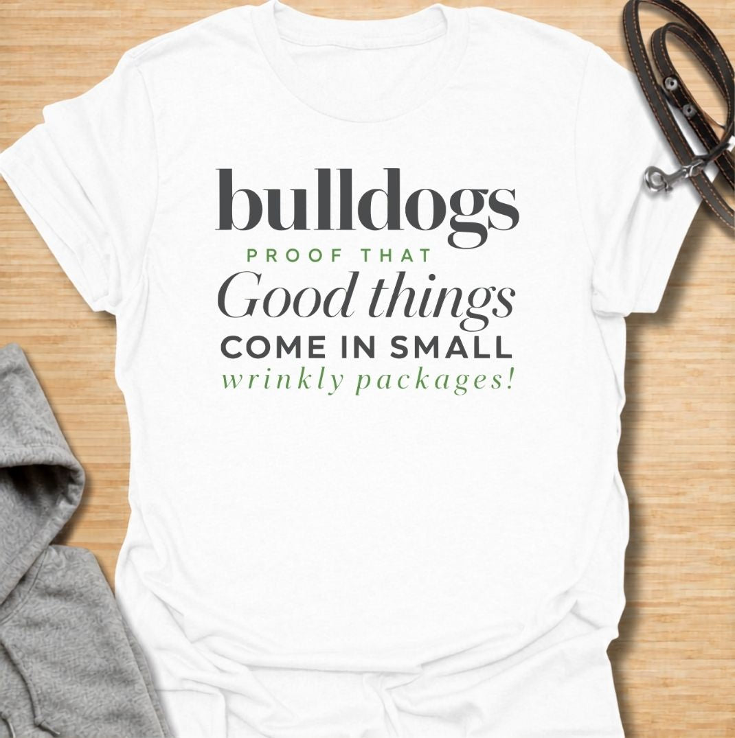 A funny bulldog T-shirt for anyone who loves those compact dogs with oversized personalities and unmistakable wrinkles. Featuring the phrase “Bulldogs — Proof That Good Things Come in Small Wrinkly Packages,” this clean text-based design celebrates the breed’s charm with warm, affectionate humor. Perfect for bulldog moms, bulldog dads, French Bulldog lovers, English Bulldog owners, and anyone who adores wrinkly little dogs. A playful everyday tee for fans of bulldog humor, dog lover gifts, and breed-specifi