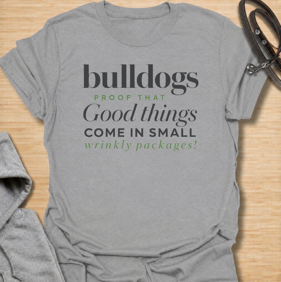 A funny bulldog T-shirt for anyone who loves those compact dogs with oversized personalities and unmistakable wrinkles. Featuring the phrase “Bulldogs — Proof That Good Things Come in Small Wrinkly Packages,” this clean text-based design celebrates the breed’s charm with warm, affectionate humor. Perfect for bulldog moms, bulldog dads, French Bulldog lovers, English Bulldog owners, and anyone who adores wrinkly little dogs. A playful everyday tee for fans of bulldog humor, dog lover gifts, and breed-specifi