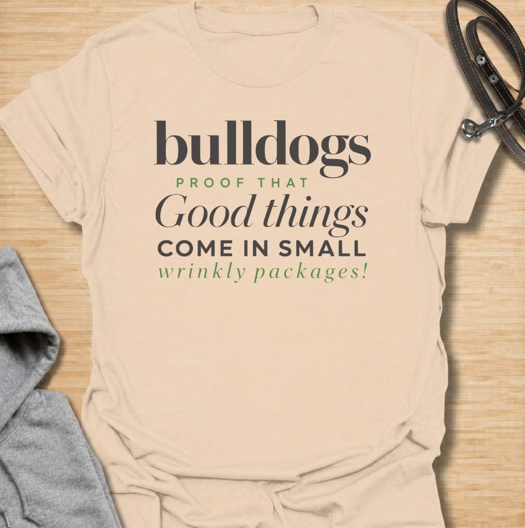 A funny bulldog T-shirt for anyone who loves those compact dogs with oversized personalities and unmistakable wrinkles. Featuring the phrase “Bulldogs — Proof That Good Things Come in Small Wrinkly Packages,” this clean text-based design celebrates the breed’s charm with warm, affectionate humor. Perfect for bulldog moms, bulldog dads, French Bulldog lovers, English Bulldog owners, and anyone who adores wrinkly little dogs. A playful everyday tee for fans of bulldog humor, dog lover gifts, and breed-specifi