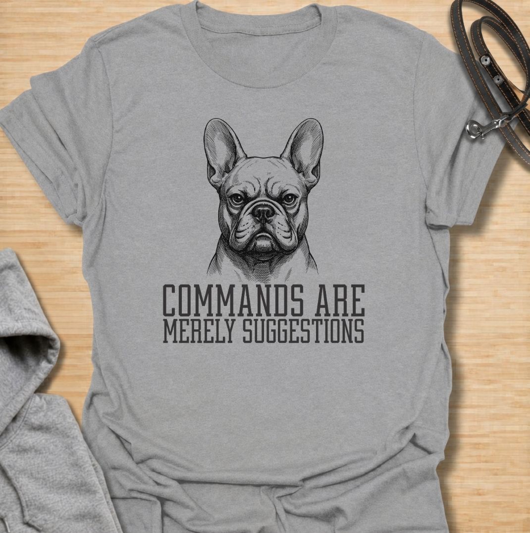 A funny French Bulldog T-shirt for anyone who knows obedience is often open to interpretation. Featuring the phrase “Commands Are Merely Suggestions” with a bold vintage-style Frenchie portrait, this design captures the breed’s stubborn, independent personality perfectly. Ideal for French Bulldog moms, Frenchie dads, bulldog lovers, and anyone familiar with selective cooperation. A playful everyday tee for fans of Frenchie humor, sarcastic dog sayings, and breed-specific gifts.