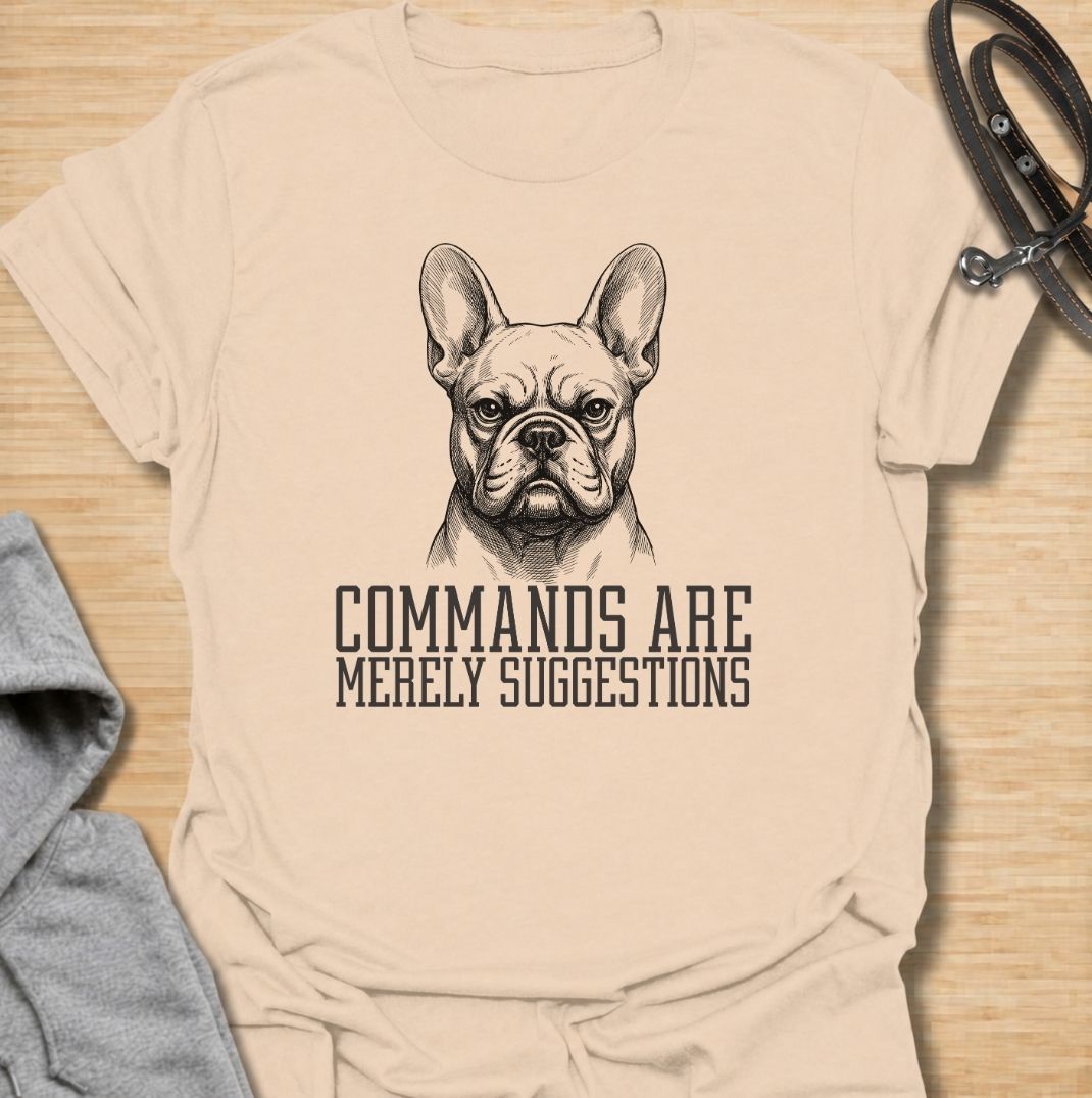 A funny French Bulldog T-shirt for anyone who knows obedience is often open to interpretation. Featuring the phrase “Commands Are Merely Suggestions” with a bold vintage-style Frenchie portrait, this design captures the breed’s stubborn, independent personality perfectly. Ideal for French Bulldog moms, Frenchie dads, bulldog lovers, and anyone familiar with selective cooperation. A playful everyday tee for fans of Frenchie humor, sarcastic dog sayings, and breed-specific gifts.