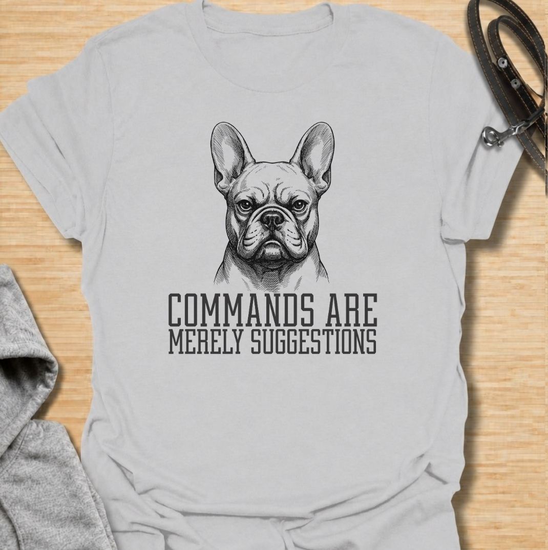 A funny French Bulldog T-shirt for anyone who knows obedience is often open to interpretation. Featuring the phrase “Commands Are Merely Suggestions” with a bold vintage-style Frenchie portrait, this design captures the breed’s stubborn, independent personality perfectly. Ideal for French Bulldog moms, Frenchie dads, bulldog lovers, and anyone familiar with selective cooperation. A playful everyday tee for fans of Frenchie humor, sarcastic dog sayings, and breed-specific gifts.