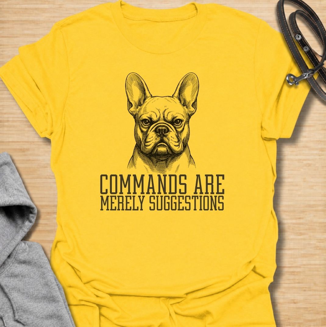 A funny French Bulldog T-shirt for anyone who knows obedience is often open to interpretation. Featuring the phrase “Commands Are Merely Suggestions” with a bold vintage-style Frenchie portrait, this design captures the breed’s stubborn, independent personality perfectly. Ideal for French Bulldog moms, Frenchie dads, bulldog lovers, and anyone familiar with selective cooperation. A playful everyday tee for fans of Frenchie humor, sarcastic dog sayings, and breed-specific gifts.