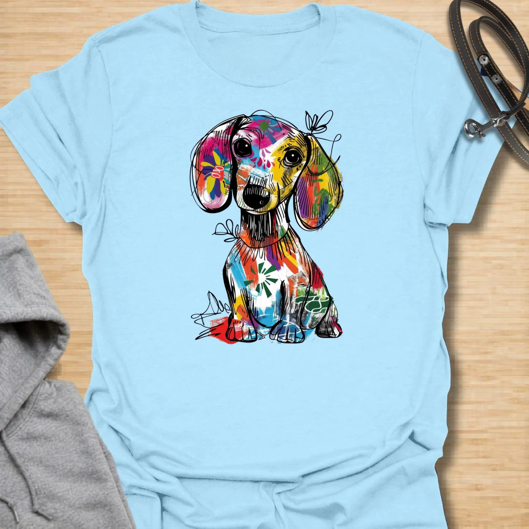 This abstract dachshund t-shirt is full of color, personality, and playful dog lover energy. The bold paint-splash style gives the classic dachshund silhouette a fun, artsy twist that stands out from ordinary dog shirts. It is perfect for dachshund moms, doxie dads, and anyone who loves long dogs with big character. A bright, expressive choice for casual days, dog walks, coffee runs, or gifting to a dachshund lover.