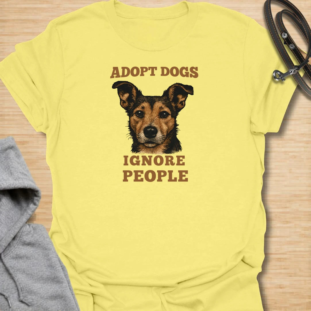 This adopt dogs ignore people t-shirt is perfect for rescue dog lovers with a strong sense of humor. The bold vintage-style text and loyal dog portrait make the design simple, readable, and full of personality. It is a great choice for dog moms, dog dads, rescue supporters, and anyone who would rather spend time with dogs than deal with people. A fun everyday shirt for shelter volunteers, adopters, foster families, and proud dog people who believe rescue dogs deserve all the attention.